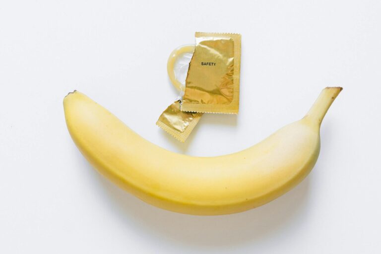condom next to yellow banana