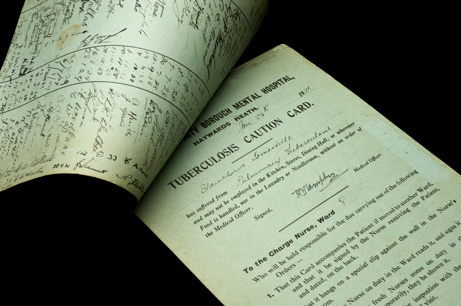 Two tuberculosis caution cards